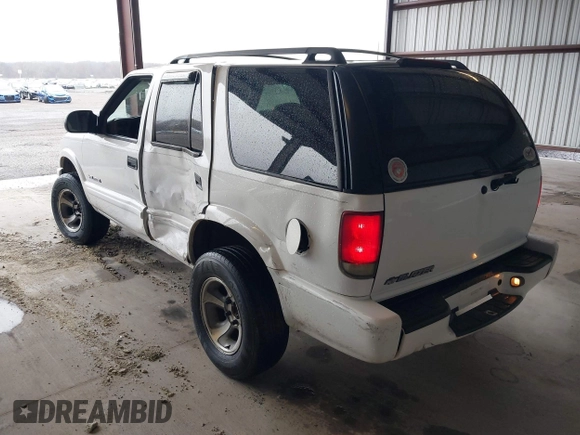 2004 Chevrolet Blazer LS z VIN 1GNDT13X64K129093, wystawiony jako IAAI lot #41860109 z przebiegiem 175 588 mil mil oraz . Historia ofert i sprzedaży dostępna na DreamBid. Obrazek 3.