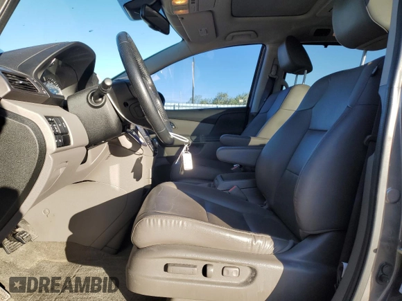 2015 Honda Odyssey Touring Elite with VIN 5FNRL5H94FB037299, listed as a Copart auction lot 53886345 with 109,032 mi miles and Salvage Title. Bid and sale history available at DreamBid. Image 7.