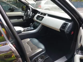 2016 Land Rover Range Rover Sport Dynamic z VIN SALWR2EF5GA555354, wystawiony jako IAAI lot #42412685 z przebiegiem 96 443 mil mil oraz . Historia ofert i sprzedaży dostępna na DreamBid. Obrazek 5.