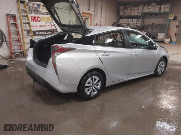 2017 Toyota Prius Two z VIN JTDKARFU1H3037959, wystawiony jako IAAI lot #41509021 z przebiegiem 82 500 mil mil oraz . Historia ofert i sprzedaży dostępna na DreamBid. Obrazek 4.