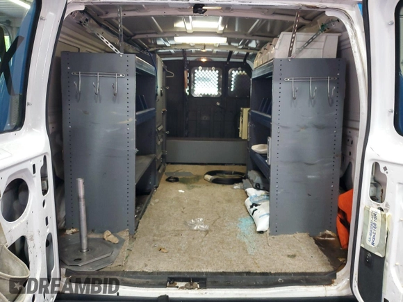 2013 Ford Econoline Cargo Commercial with VIN 1FTNE2EL5DDB27606, listed as a IAAI auction lot 42734078 with 122,369 mi miles and . Bid and sale history available at DreamBid. Image 9.