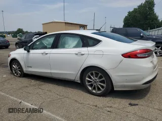 2017 Ford Fusion Hybrid SE with VIN 3FA6P0LU2HR380867, listed as a Copart auction lot 60428215 with 330,201 mi miles and Salvage title. Bid and sale history available at DreamBid. Image 2.