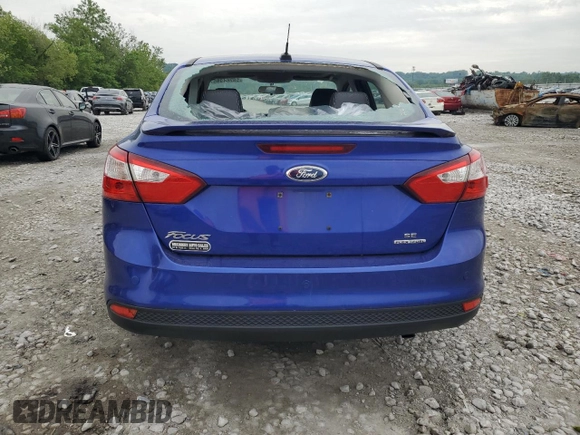 2013 Ford Focus SE with VIN 1FADP3F23DL218421, listed as a Copart auction lot 58264995 with 71,088 mi miles and Salvage title. Bid and sale history available at DreamBid. Image 6.