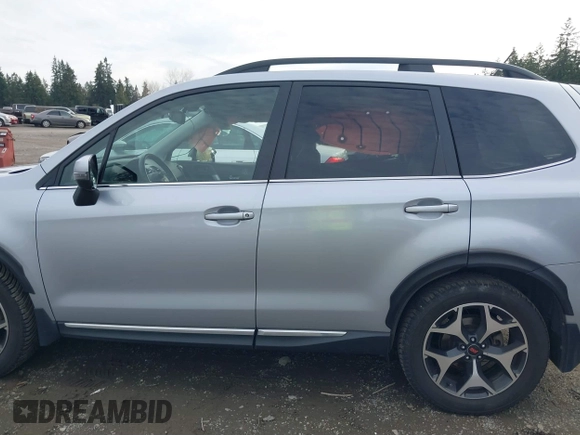 2015 Subaru Forester XT Touring with VIN JF2SJGWC1FH571301, listed as a IAAI auction lot 41682258 with 51,505 mi miles and . Bid and sale history available at DreamBid. Image 15.