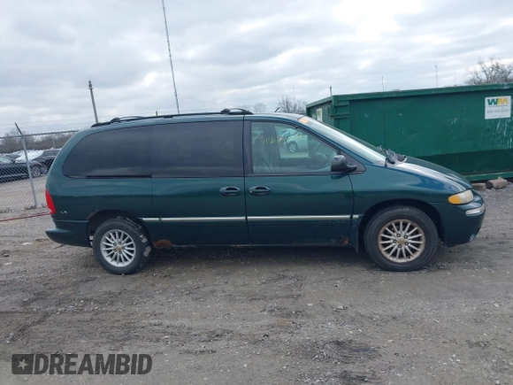 1999 Chrysler Town & Country with VIN 1C4GP54G6XB603564, listed as a IAAI auction lot 41823340 with 104,321 mi miles and . Bid and sale history available at DreamBid. Image 13.