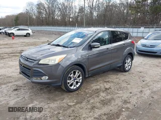 2013 Ford Escape SEL with VIN 1FMCU0HX8DUD68360, listed as a IAAI auction lot 41427968 with 129,067 mi miles. Bid and sale history available at carsss.com. Image 2.