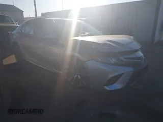 2018 Toyota Camry LE with VIN 4T1B11HK9JU068675, listed as a IAAI auction lot 41299139 with 144,675 mi miles. Bid and sale history available at carsss.com. Image 1.