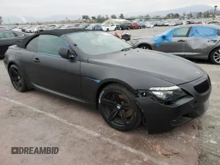 2009 BMW 6 Series M6 with VIN WBSEK935X9CY80091, listed as a Copart auction lot 43348935 with 128,438 mi miles and Clean Title. Bid and sale history available at carsss.com. Image 4.