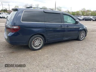 2007 Honda Odyssey EX-L with VIN 5FNRL38737B031255, listed as a IAAI auction lot 42040035 with 233,369 mi miles. Bid and sale history available at carsss.com. Image 4.