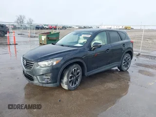 2016 Mazda CX-5 Grand Touring with VIN JM3KE4DY3G0769448, listed as a IAAI auction lot 41947725 with 154,051 mi miles and . Bid and sale history available at carsss.com. Image 21.
