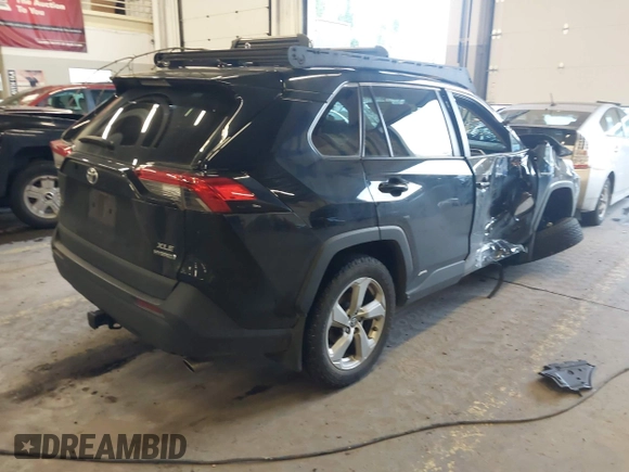 2021 Toyota RAV4 Hybrid LE with VIN 4T3B6RFV2MU048602, listed as a IAAI auction lot 41663576 with 69,404 mi miles. Bid and sale history available at carsss.com. Image 4.