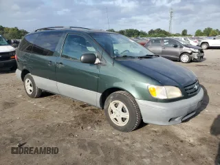 2001 Toyota Sienna LE with VIN 4T3ZF13C51U345619, listed as a Copart auction lot 71761094 with 165,000 mi miles and Salvage Title. Bid and sale history available at carsss.com. Image 4.