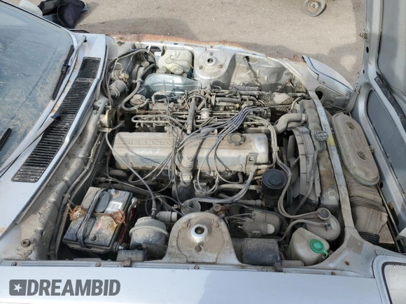 1981 Datsun 280ZX z VIN JN1HZ04S2BX413331, wystawiony jako Copart lot #50431235 z przebiegiem 98 237 mil mil oraz Tytuł czysty. Historia ofert i sprzedaży dostępna na DreamBid. Obrazek 11.