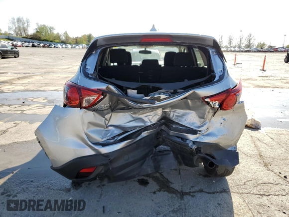 2016 Mazda CX-5 Touring with VIN JM3KE2CY8G0614335, listed as a Copart auction lot 52124465 with 218,320 mi miles and Salvage Title. Bid and sale history available at carsss.com. Image 6.