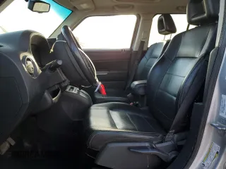 2009 Jeep Patriot with VIN 1J8FF48B49D221606, listed as a Copart auction lot 49596465 with 168,305 mi miles and Salvage title. Bid and sale history available at DreamBid. Image 7.