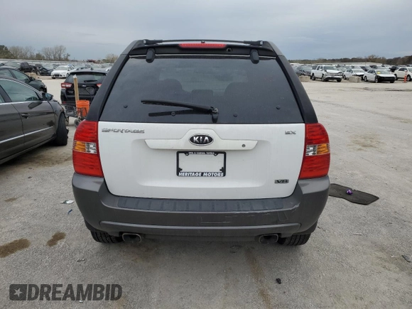 2005 Kia Sportage LX with VIN KNDJF723057125954, listed as a Copart auction lot 79454554 with 179,811 mi miles and Salvage Title. Bid and sale history available at carsss.com. Image 6.
