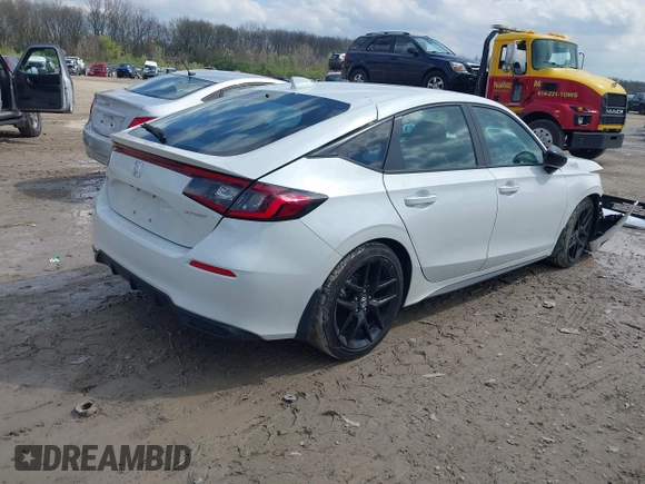 2023 Honda Civic Sport with VIN 19XFL2H80PE010813, listed as a IAAI auction lot 41999917 with 20,734 mi miles and . Bid and sale history available at DreamBid. Image 4.