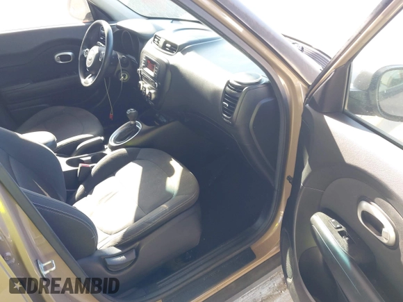2014 Kia Soul with VIN KNDJN2A20E7077211, listed as a IAAI auction lot 42104641 with 90,241 mi miles and . Bid and sale history available at DreamBid. Image 5.