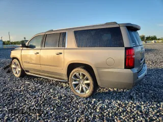 2019 Chevrolet Suburban LT with VIN 1GNSCJKC3KR129739, listed as a Copart auction lot 62377465 with 105,771 mi miles and Salvage title. Bid and sale history available at DreamBid. Image 2.