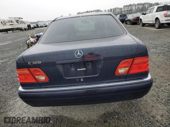 1997 Mercedes-Benz E-Class with VIN WDBJF55FXVJ027722, listed as a Copart auction lot 44835585 with 0 mi miles and Salvage Title. Bid and sale history available at carsss.com. Image 6.