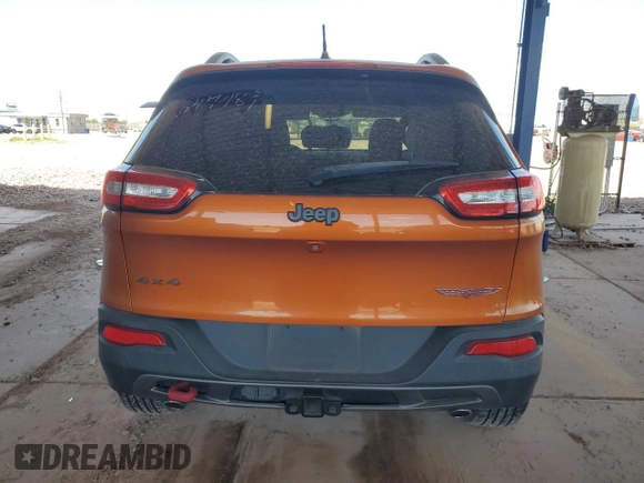 2015 Jeep Cherokee Trailhawk z VIN 1C4PJMBS4FW647489, wystawiony jako Copart lot #53362135 z przebiegiem 53 139 mil mil oraz Szkoda całkowita • Salvage title. Historia ofert i sprzedaży dostępna na DreamBid. Obrazek 6.