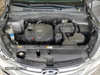 2014 Hyundai Santa Fe with VIN 5XYZU3LB1EG227984, listed as a Copart auction lot 59569905 with 102,477 mi miles and Salvage title. Bid and sale history available at DreamBid. Image 12.