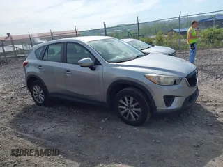 2014 Mazda CX-5 Sport with VIN JM3KE2BE9E0423737, listed as a IAAI auction lot 42222646 with 116,160 mi miles and . Bid and sale history available at DreamBid. Image 13.