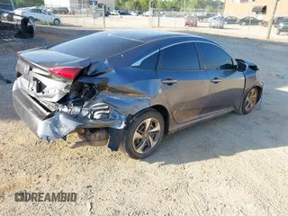 2020 Honda Civic LX with VIN 2HGFC2F67LH534381, listed as a IAAI auction lot 42056676 with 124,344 mi miles and . Bid and sale history available at DreamBid. Image 4.