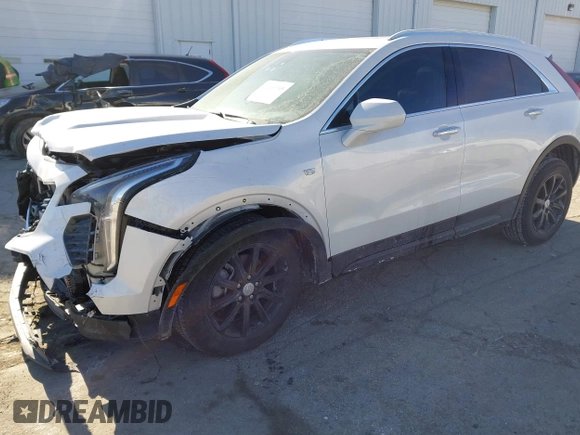 2022 Cadillac XT4 AWD Luxury with VIN 1GYFZBR42NF170554, listed as a IAAI auction lot 41409705 with 38,727 mi miles and . Bid and sale history available at carsss.com. Image 2.