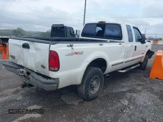 1999 Ford Super Duty F-250 XL with VIN 1FTNX21F5XED46431, listed as a IAAI auction lot 41918964 with 269,834 mi miles. Bid and sale history available at carsss.com. Image 4.