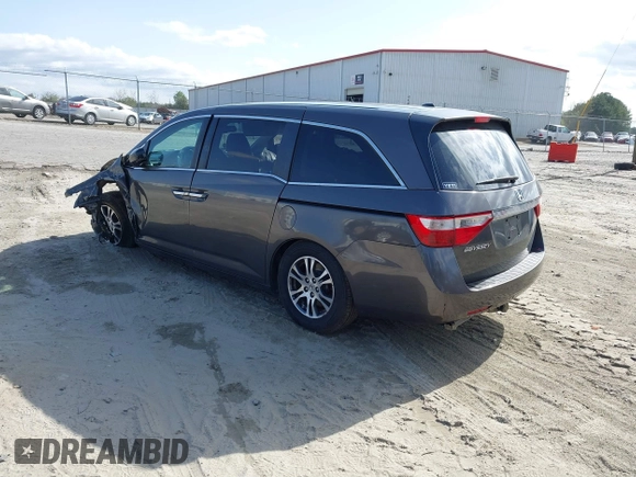 2013 Honda Odyssey EX-L with VIN 5FNRL5H62DB035649, listed as a IAAI auction lot 41849123 with 176,392 mi miles and . Bid and sale history available at carsss.com. Image 3.