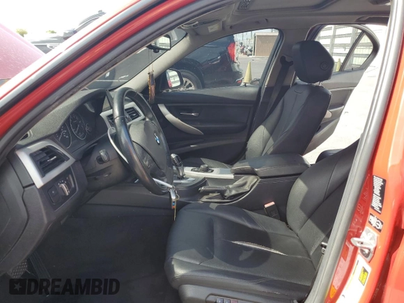 2013 BMW 3 Series 328i xDrive with VIN WBA3B3C5XDJ810958, listed as a Copart auction lot 60620005 with 143,589 mi miles and Salvage title. Bid and sale history available at DreamBid. Image 7.
