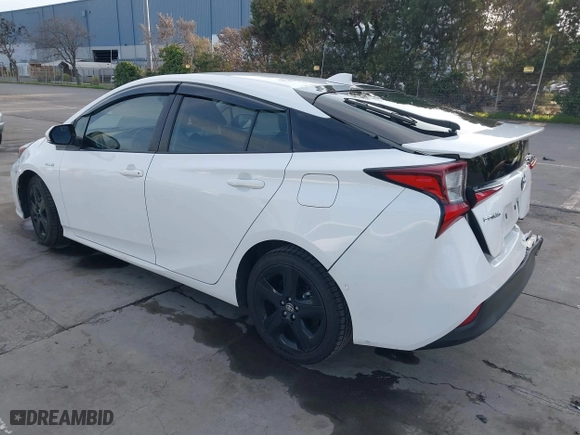 2021 Toyota Prius L Eco with VIN JTDKAMFU9M3131228, listed as a IAAI auction lot 41257117 with 72,840 mi miles. Bid and sale history available at carsss.com. Image 3.