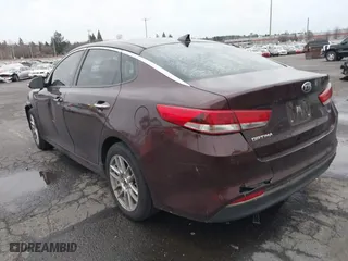 2016 Kia Optima EX with VIN 5XXGU4L31GG004714, listed as a IAAI auction lot 41183230 with 108,084 mi miles. Bid and sale history available at carsss.com. Image 3.