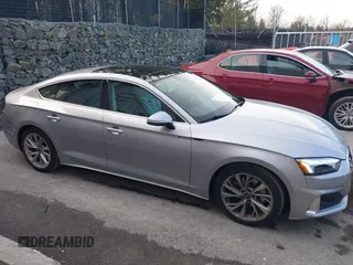 2024 Audi A5 Sportback Premium z VIN WAUABCF57RA023069, wystawiony jako IAAI lot #39079825 z przebiegiem 2 810 mil mil oraz . Historia ofert i sprzedaży dostępna na DreamBid. Obrazek 13.