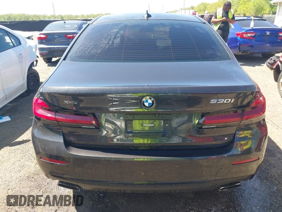 2021 BMW 5 Series 530i xDrive with VIN WBA13BJ0XMWX00677, listed as a IAAI auction lot 42100435 with 66,140 mi miles and . Bid and sale history available at DreamBid. Image 17.