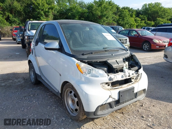 2015 Smart fortwo Passion with VIN WMEEJ3BA4FK800163, listed as a IAAI auction lot 42180126 with 53,138 mi miles. Bid and sale history available at carsss.com. Image 1.