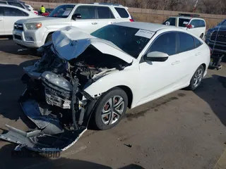2016 Honda Civic Sedan LX with VIN 2HGFC2F58GH515190, listed as a IAAI auction lot 41017534 with 135,389 mi miles. Bid and sale history available at carsss.com. Image 2.