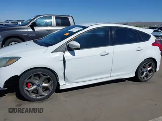 2014 Ford Focus ST with VIN 1FADP3L92EL341579, listed as a IAAI auction lot 42106528 with 104,150 mi miles and . Bid and sale history available at carsss.com. Image 6.