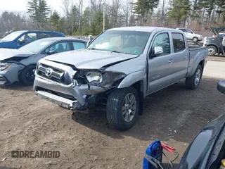 2015 Toyota Tacoma with VIN 3TMMU4FN7FM075543, listed as a IAAI auction lot 41761520 with 107,230 mi miles and . Bid and sale history available at DreamBid. Image 2.