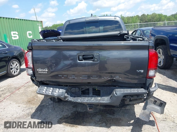 2021 Toyota Tacoma SR z VIN 3TMCZ5AN2MM392590, wystawiony jako IAAI lot #42178072 z przebiegiem 42 542 mil mil oraz . Historia ofert i sprzedaży dostępna na DreamBid. Obrazek 16.