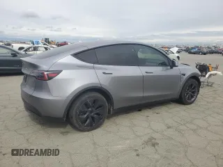 2025 Tesla Model Y Long Range with VIN 7SAYGDED7SF227582, listed as a Copart auction lot 47556595 with 5,340 mi miles and Salvage Title. Bid and sale history available at DreamBid. Image 3.