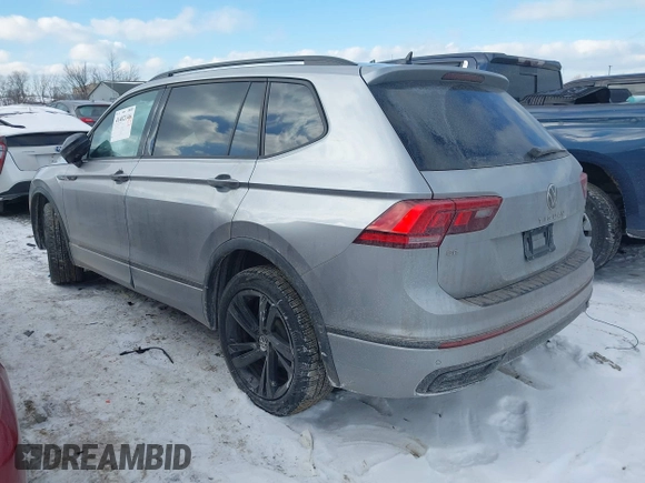 2023 Volkswagen Tiguan SE R-Line Black with VIN 3VV8B7AX3PM106873, listed as a IAAI auction lot 41402146 with 26,701 mi miles and . Bid and sale history available at DreamBid. Image 3.