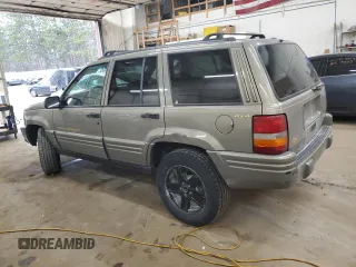 1996 Jeep Grand Cherokee Limited with VIN 1J4GZ78S5TC210710, listed as a Copart auction lot 81307904 with 285,169 mi miles and Salvage Title. Bid and sale history available at carsss.com. Image 2.