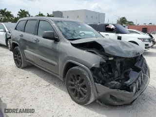 2021 Jeep Grand Cherokee Laredo X with VIN 1C4RJEAG7MC624802, listed as a Copart auction lot 48242715 with 72,144 mi miles and Salvage Title. Bid and sale history available at carsss.com. Image 4.