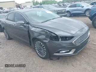 2017 Ford Fusion SE with VIN 3FA6P0T9XHR186017, listed as a IAAI auction lot 42535725 with 166,794 mi miles and . Bid and sale history available at DreamBid. Image 1.