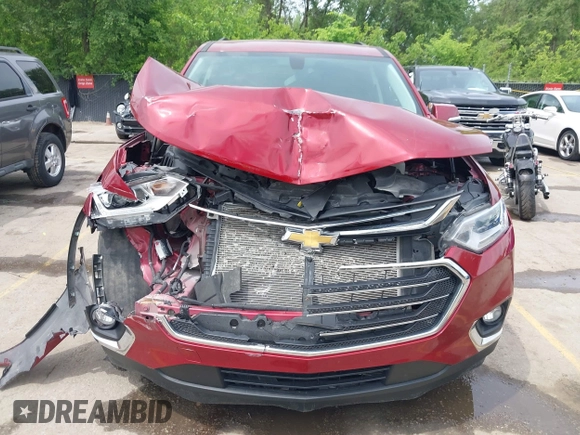 2020 Chevrolet Traverse LT Cloth z VIN 1GNEVGKW6LJ285438, wystawiony jako IAAI lot #42188972 z przebiegiem 53 628 mil mil oraz . Historia ofert i sprzedaży dostępna na DreamBid. Obrazek 6.