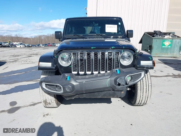 2023 Jeep Wrangler 4xe Sahara with VIN 1C4JJXP62PW613040, listed as a IAAI auction lot 41489171 with 36,818 mi miles. Bid and sale history available at carsss.com. Image 6.