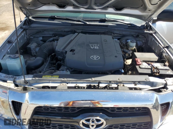 2011 Toyota Tacoma PreRunner z VIN 5TFTU4GN6BX010584, wystawiony jako Copart lot #57284685 z przebiegiem 66 256 mil mil oraz Szkoda całkowita • Salvage title. Historia ofert i sprzedaży dostępna na DreamBid. Obrazek 11.