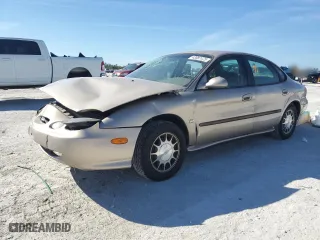 1999 Ford Taurus SE with VIN 1FAFP53SXXA189489, listed as a Copart auction lot 43087475 with 138,174 mi miles and Salvage Title. Bid and sale history available at carsss.com. Image 1.